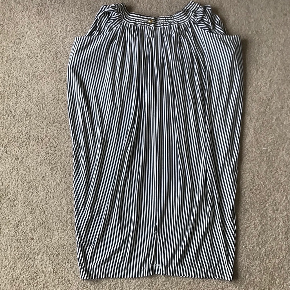 Styled! Includes: midriff top, skirt, necklace. - Picture 3 of 4